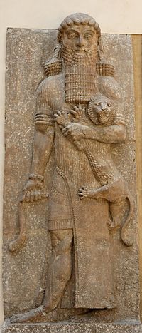 Gilgamesh, un gigante con un le�n del palacio
                      de Sargon II (fue robada la figura y est� en Paris
                      en el Louvre desde decenios)