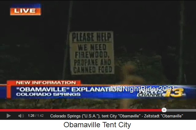 Zeltstadt in Colorado Springs mit Schild f�r
                Hilfe - tent city in Colorado Springs with a shield for
                help