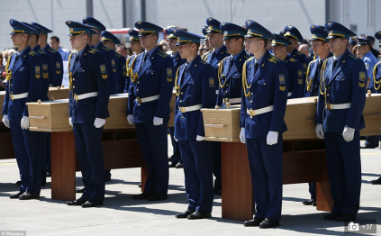 Coffins allegedly with dead bodies from
                        flight MH17 from July 17, 2014 in Holland