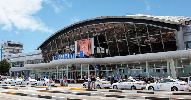 Kiev
                          airport "Borispol", terminal B with
                          the control tower in the background - high
                          criminality is performed here on July 17,
                          2014