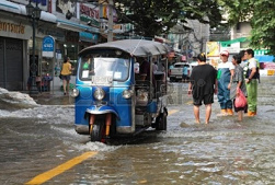 Tuktuk taxi in flooded Bangkok
