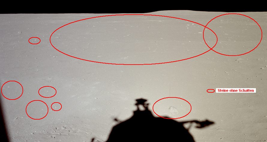 Apollo 11 Foto-Nr. AS11-37-5474:
                        Nahaufnahme der vielen Steinen ohne Schatten
                        oder der unfertigen, weissen Flchen als Steine