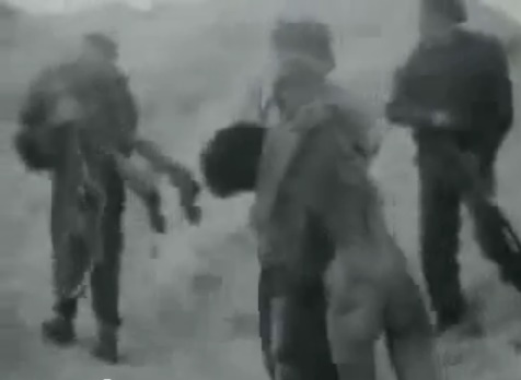 SS
                            men have to take the dead bodies from the
                            trailer to the pit, the bodies have no spots
                            (14min. 30sec.)