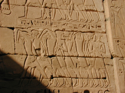 Philistines with feathers on their heads.
                      Illustration in the temple in Medinet Habu, built
                      under Ramesses III
