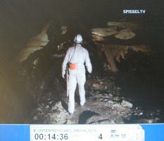 Walpersberg near Kahla 17: tunnel
                          caretaker Heinz Rabe walking in a tunnel