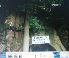 Doggerwerk near Hersbruck 01: portal of a
                          tunnel, upper part with a shield
                          "Feldhaus Bergbau" ("Field
                          House Mining")