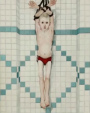 Picture by Bilyana Dyurdyeich (from
                      Pizza Gate): a tied boy is on the floor of a
                      swimming pool